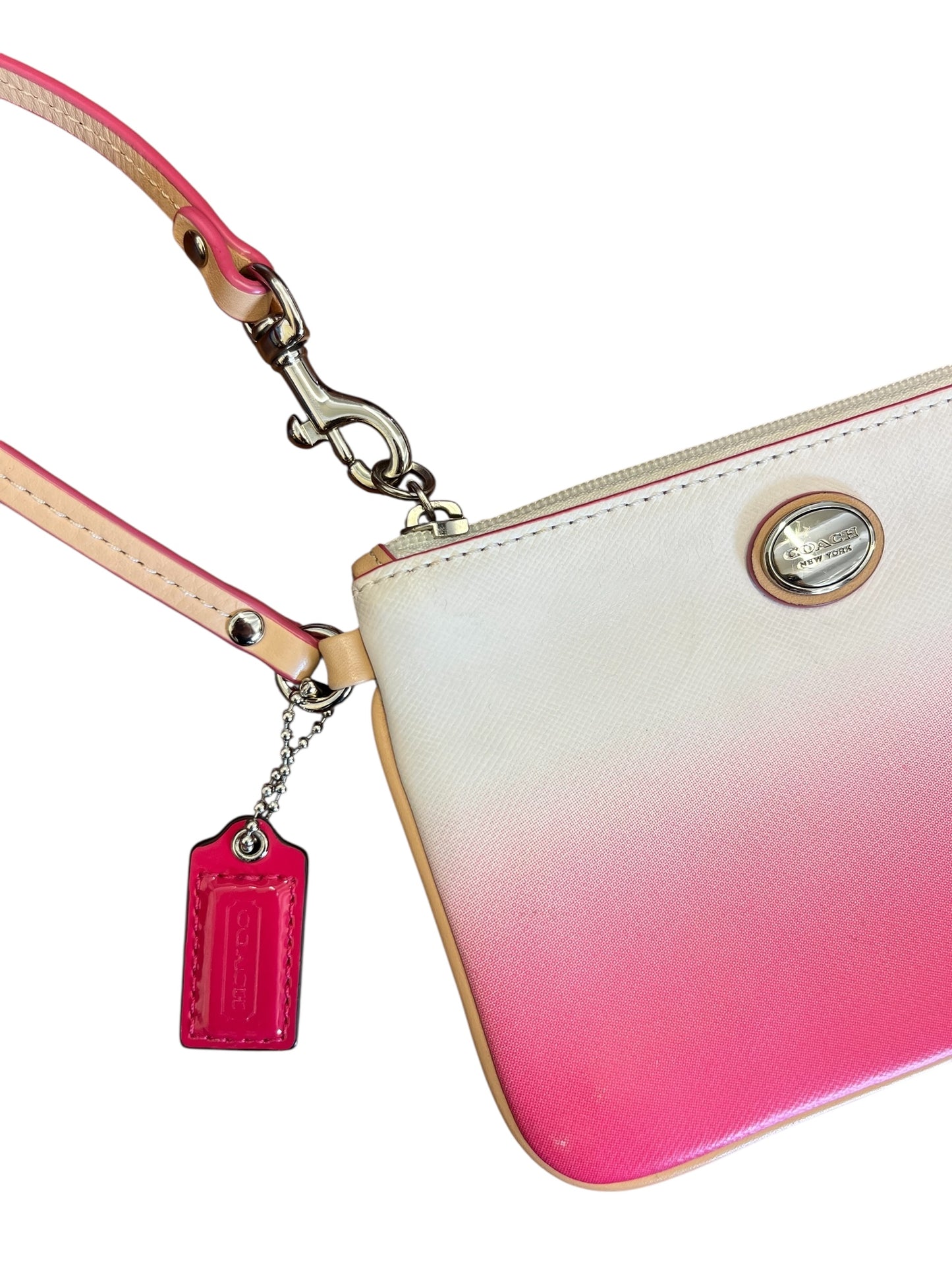 pink and white Coach wallet
