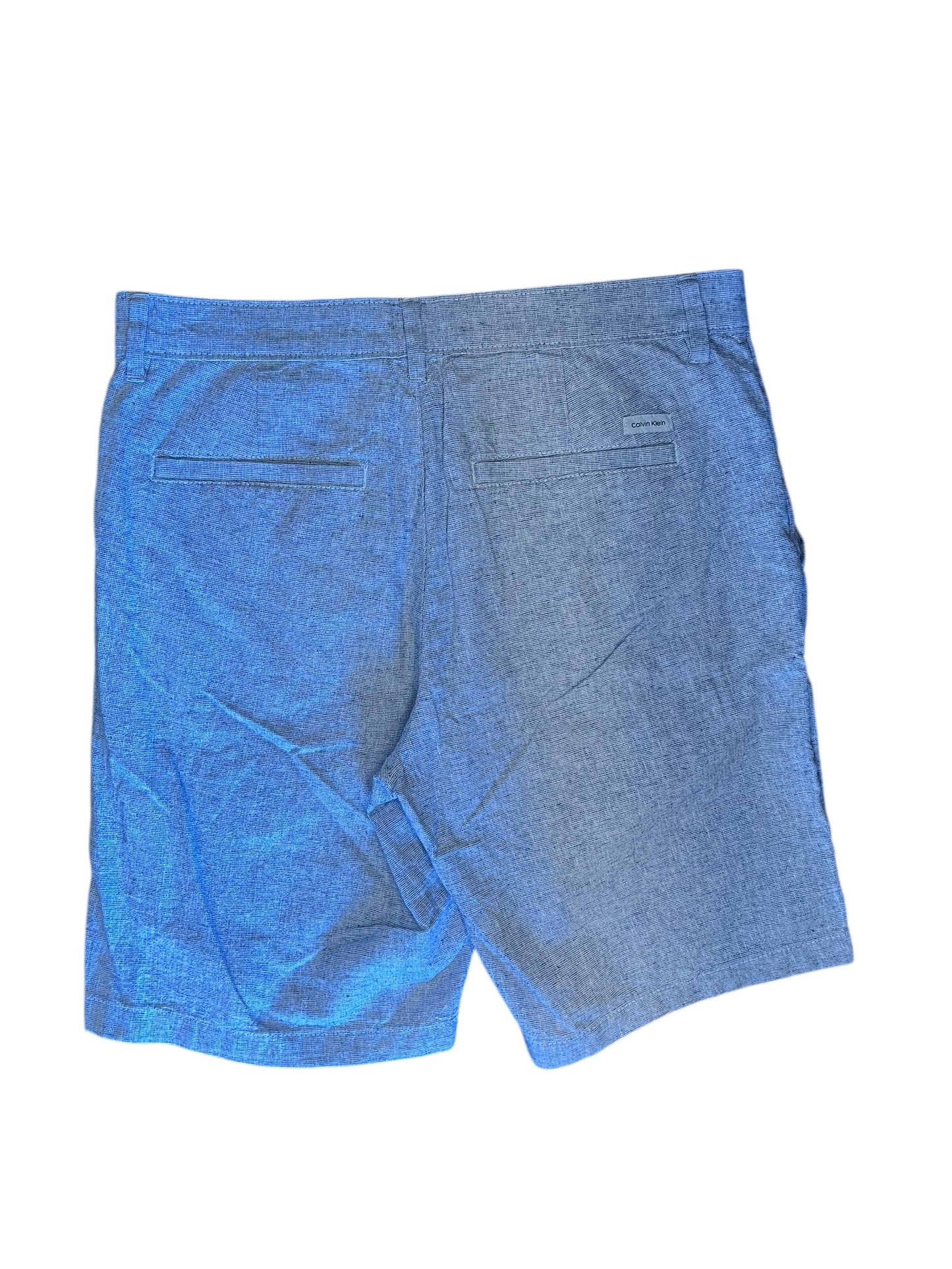 Blue Calvin Klein shorts, 30