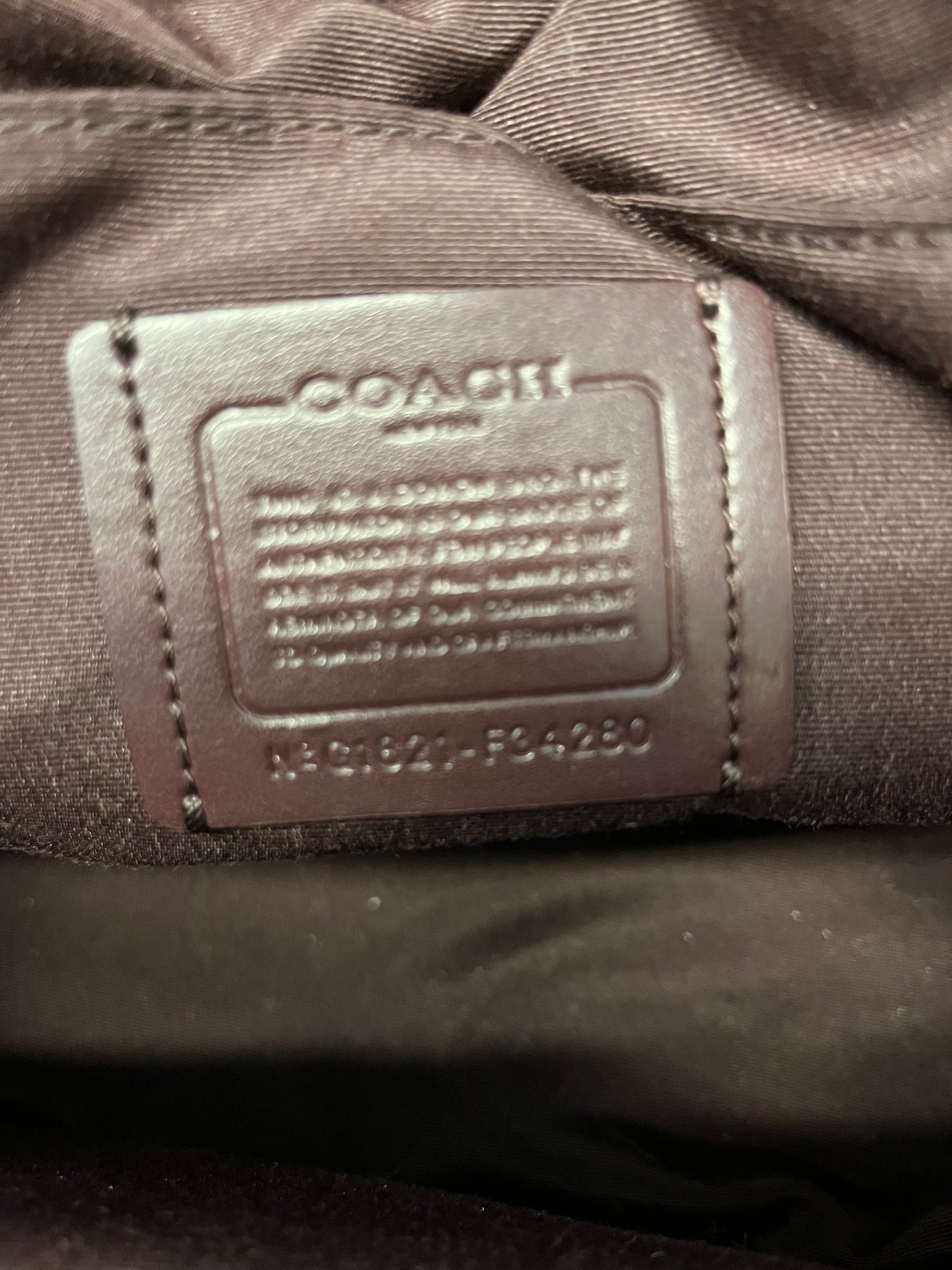 black and brown Coach Satchel
