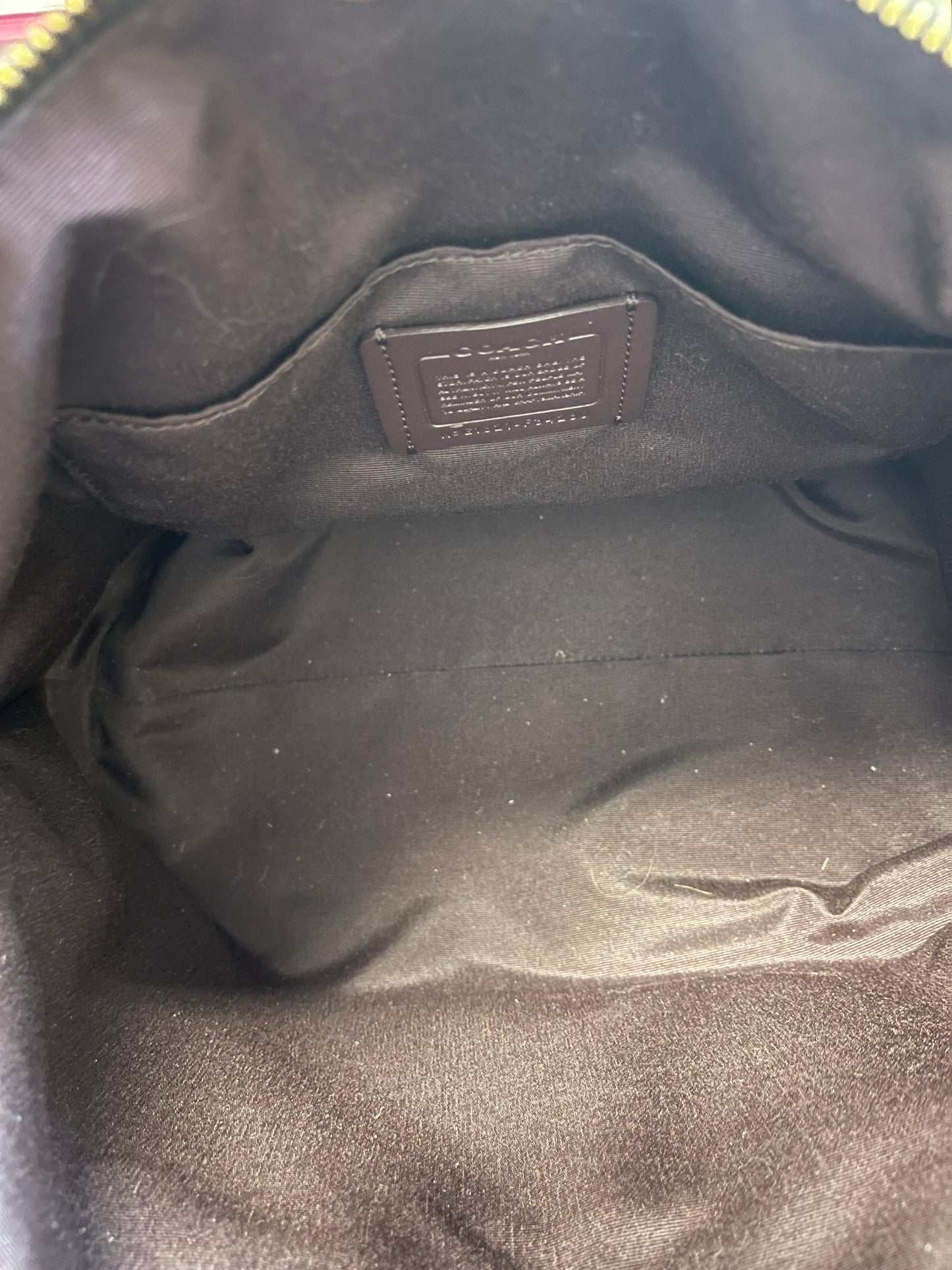 black and brown Coach Satchel