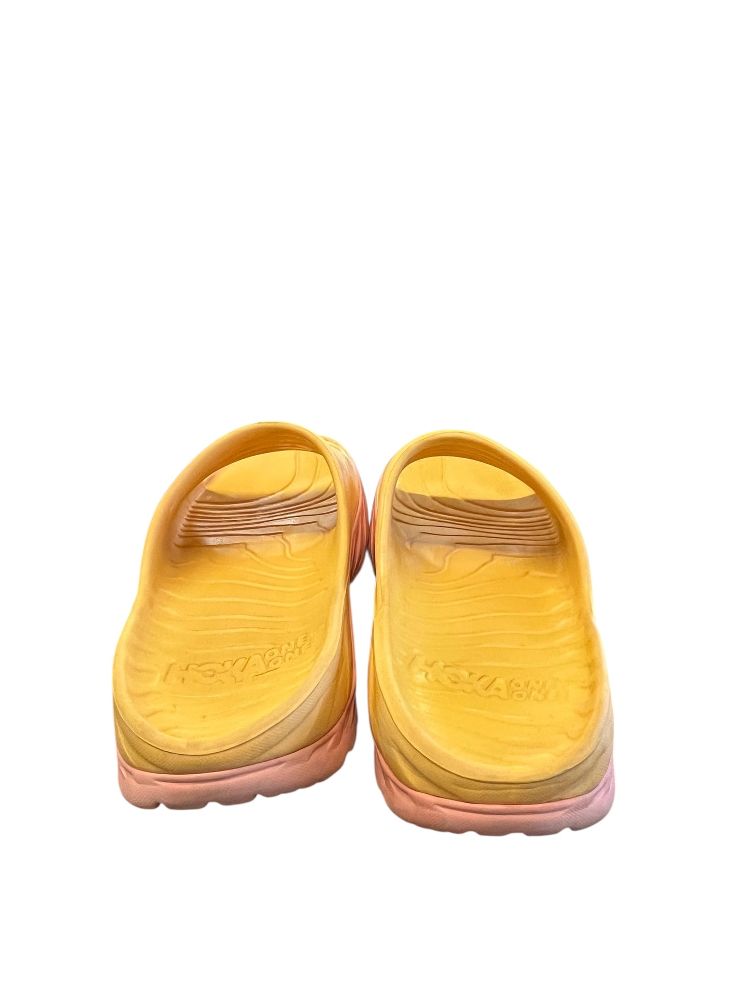 orange Hoka sandals, 11