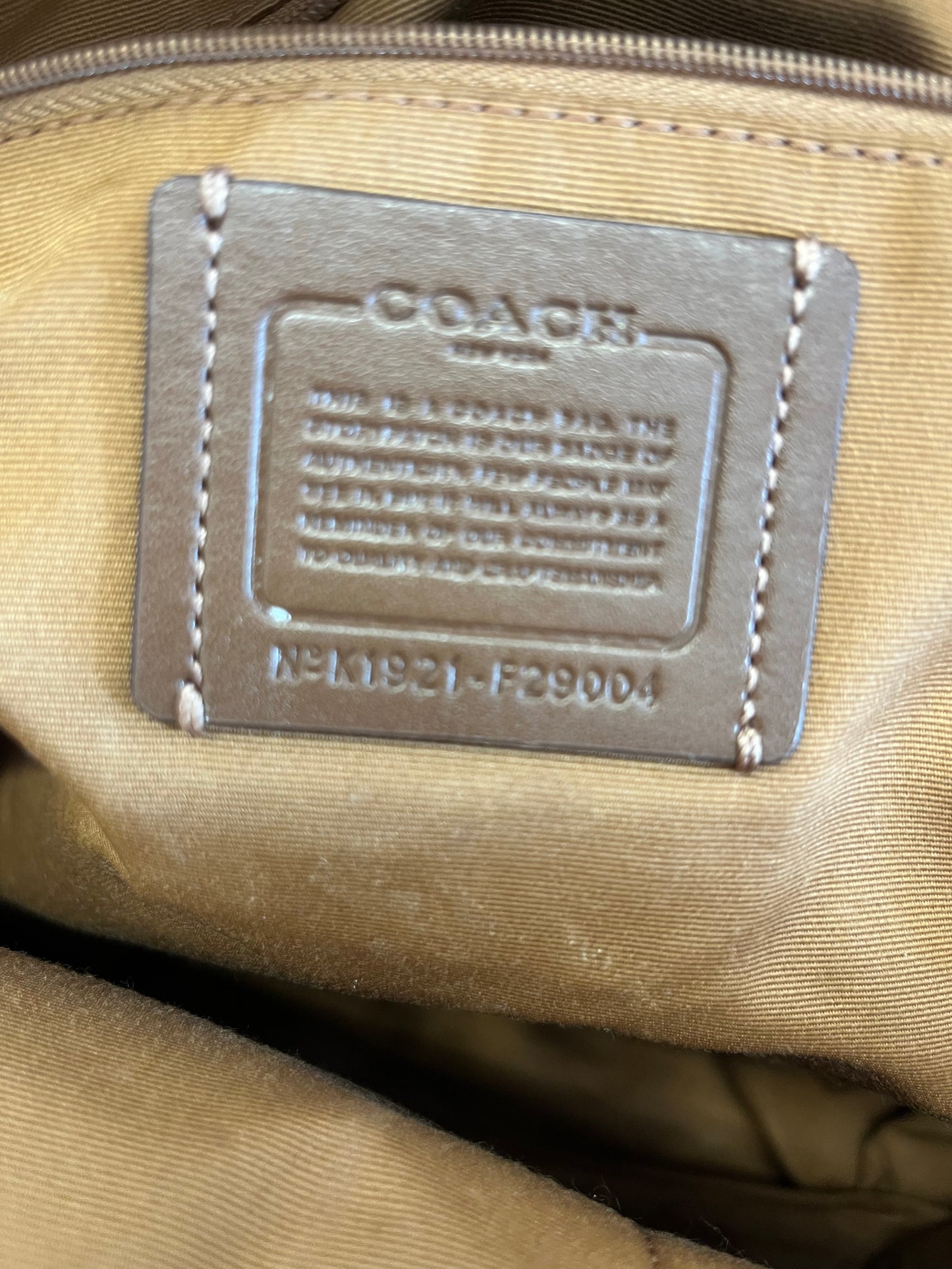 Tan Coach backpack